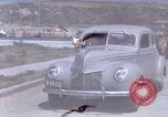 Image of Advertisement for smooth ride of 1939 Ford automobiles United States USA, 1939, second 13 stock footage video 65675051551