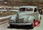 Image of Advertisement for smooth ride of 1939 Ford automobiles United States USA, 1939, second 14 stock footage video 65675051551