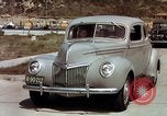 Image of Advertisement for smooth ride of 1939 Ford automobiles United States USA, 1939, second 15 stock footage video 65675051551