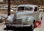 Image of Advertisement for smooth ride of 1939 Ford automobiles United States USA, 1939, second 17 stock footage video 65675051551