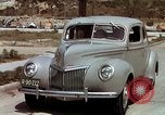 Image of Advertisement for smooth ride of 1939 Ford automobiles United States USA, 1939, second 18 stock footage video 65675051551