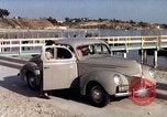 Image of Advertisement for smooth ride of 1939 Ford automobiles United States USA, 1939, second 40 stock footage video 65675051551
