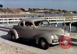 Image of Advertisement for smooth ride of 1939 Ford automobiles United States USA, 1939, second 43 stock footage video 65675051551
