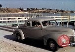 Image of Advertisement for smooth ride of 1939 Ford automobiles United States USA, 1939, second 44 stock footage video 65675051551