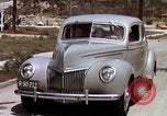 Image of Advertisement for smooth ride of 1939 Ford automobiles United States USA, 1939, second 47 stock footage video 65675051551