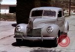 Image of Advertisement for smooth ride of 1939 Ford automobiles United States USA, 1939, second 51 stock footage video 65675051551