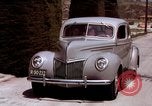 Image of Advertisement for smooth ride of 1939 Ford automobiles United States USA, 1939, second 52 stock footage video 65675051551