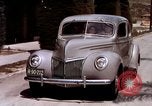 Image of Advertisement for smooth ride of 1939 Ford automobiles United States USA, 1939, second 53 stock footage video 65675051551