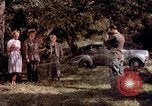 Image of People visiting a forest in their 1939 Ford car United States USA, 1939, second 22 stock footage video 65675051552
