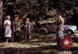 Image of People visiting a forest in their 1939 Ford car United States USA, 1939, second 23 stock footage video 65675051552