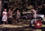Image of People visiting a forest in their 1939 Ford car United States USA, 1939, second 24 stock footage video 65675051552