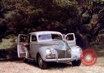 Image of People visiting a forest in their 1939 Ford car United States USA, 1939, second 39 stock footage video 65675051552