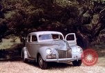 Image of People visiting a forest in their 1939 Ford car United States USA, 1939, second 40 stock footage video 65675051552