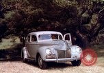 Image of People visiting a forest in their 1939 Ford car United States USA, 1939, second 41 stock footage video 65675051552