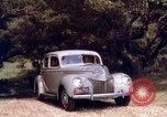 Image of People visiting a forest in their 1939 Ford car United States USA, 1939, second 43 stock footage video 65675051552