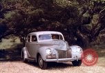 Image of People visiting a forest in their 1939 Ford car United States USA, 1939, second 44 stock footage video 65675051552