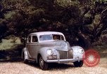 Image of People visiting a forest in their 1939 Ford car United States USA, 1939, second 45 stock footage video 65675051552
