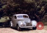 Image of People visiting a forest in their 1939 Ford car United States USA, 1939, second 46 stock footage video 65675051552