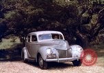 Image of People visiting a forest in their 1939 Ford car United States USA, 1939, second 47 stock footage video 65675051552