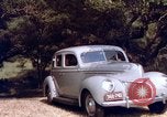 Image of People visiting a forest in their 1939 Ford car United States USA, 1939, second 48 stock footage video 65675051552