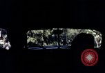 Image of People visiting a forest in their 1939 Ford car United States USA, 1939, second 51 stock footage video 65675051552