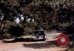 Image of People visiting a forest in their 1939 Ford car United States USA, 1939, second 54 stock footage video 65675051552