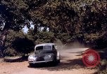 Image of People visiting a forest in their 1939 Ford car United States USA, 1939, second 55 stock footage video 65675051552