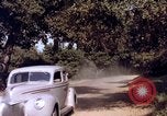 Image of People visiting a forest in their 1939 Ford car United States USA, 1939, second 56 stock footage video 65675051552