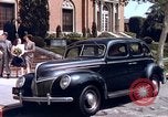 Image of Parents give daughter keys to a new Ford convertible United States USA, 1939, second 10 stock footage video 65675051553