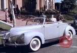 Image of Parents give daughter keys to a new Ford convertible United States USA, 1939, second 25 stock footage video 65675051553
