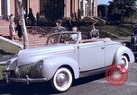 Image of Parents give daughter keys to a new Ford convertible United States USA, 1939, second 26 stock footage video 65675051553