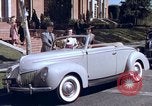 Image of Parents give daughter keys to a new Ford convertible United States USA, 1939, second 28 stock footage video 65675051553
