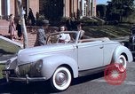 Image of Parents give daughter keys to a new Ford convertible United States USA, 1939, second 29 stock footage video 65675051553
