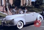 Image of Parents give daughter keys to a new Ford convertible United States USA, 1939, second 30 stock footage video 65675051553