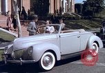 Image of Parents give daughter keys to a new Ford convertible United States USA, 1939, second 31 stock footage video 65675051553