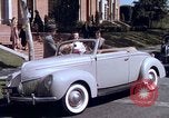 Image of Parents give daughter keys to a new Ford convertible United States USA, 1939, second 32 stock footage video 65675051553