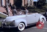 Image of Parents give daughter keys to a new Ford convertible United States USA, 1939, second 37 stock footage video 65675051553