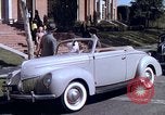 Image of Parents give daughter keys to a new Ford convertible United States USA, 1939, second 38 stock footage video 65675051553