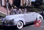 Image of Parents give daughter keys to a new Ford convertible United States USA, 1939, second 40 stock footage video 65675051553