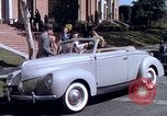 Image of Parents give daughter keys to a new Ford convertible United States USA, 1939, second 41 stock footage video 65675051553
