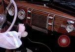 Image of Parents give daughter keys to a new Ford convertible United States USA, 1939, second 51 stock footage video 65675051553