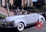 Image of Parents give daughter keys to a new Ford convertible United States USA, 1939, second 53 stock footage video 65675051553