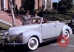 Image of Parents give daughter keys to a new Ford convertible United States USA, 1939, second 54 stock footage video 65675051553