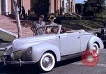 Image of Parents give daughter keys to a new Ford convertible United States USA, 1939, second 55 stock footage video 65675051553