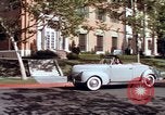 Image of Parents give daughter keys to a new Ford convertible United States USA, 1939, second 61 stock footage video 65675051553