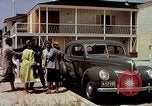 Image of motorboat pulling man and woman balanced on aquaplane United States USA, 1939, second 41 stock footage video 65675051556