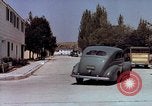 Image of motorboat pulling man and woman balanced on aquaplane United States USA, 1939, second 47 stock footage video 65675051556
