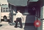 Image of buses in garage United States USA, 1937, second 3 stock footage video 65675051568