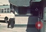 Image of buses in garage United States USA, 1937, second 4 stock footage video 65675051568