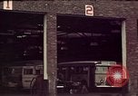 Image of buses in garage United States USA, 1937, second 12 stock footage video 65675051568